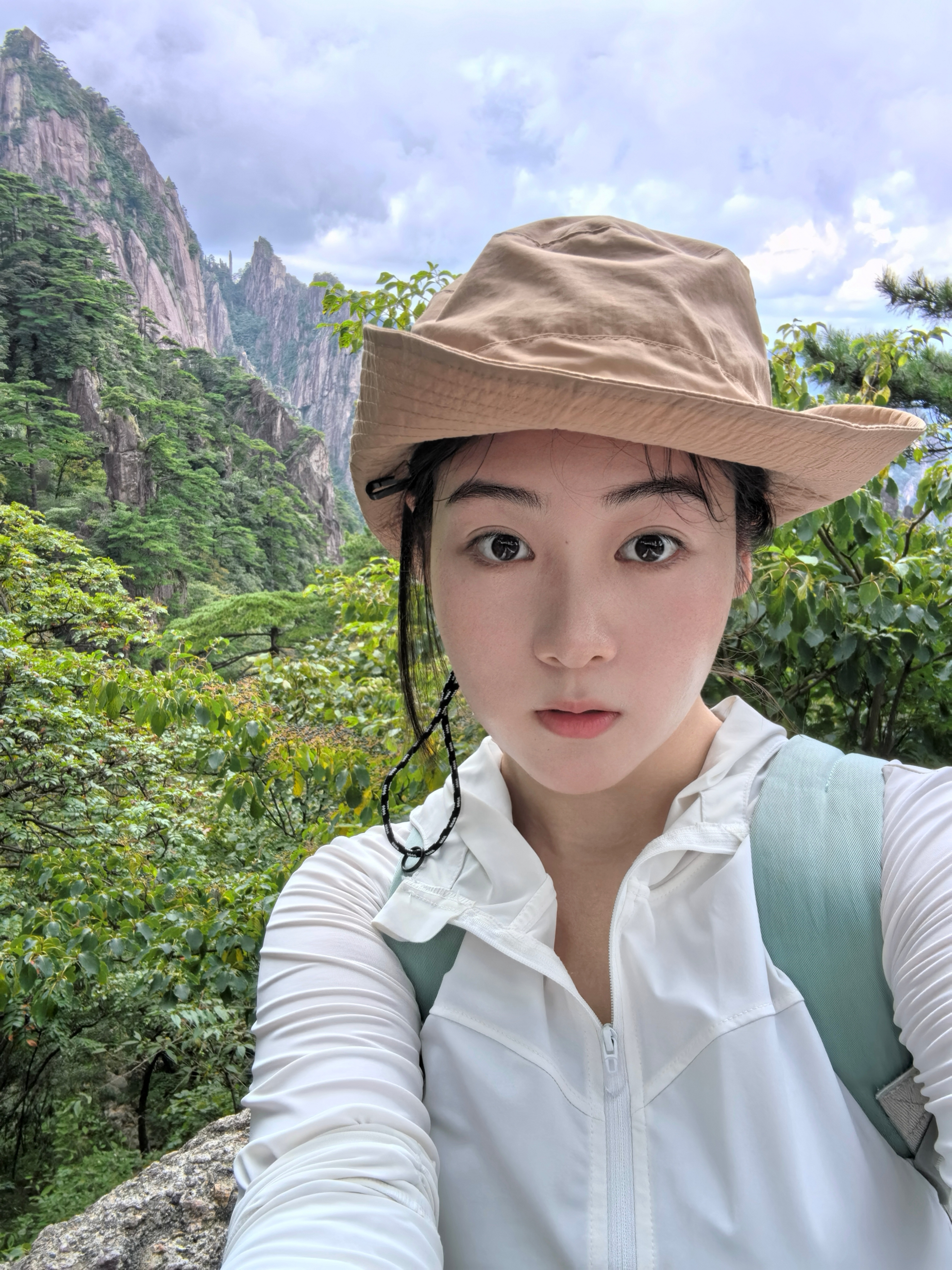 张心然